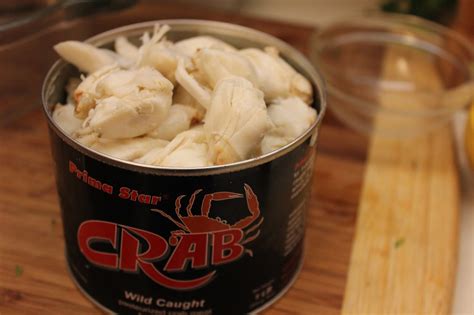 freezing crab meat in container.